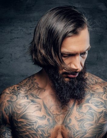 portrait-of-a-man-with-tattooed-body--e1631164186528.jpg